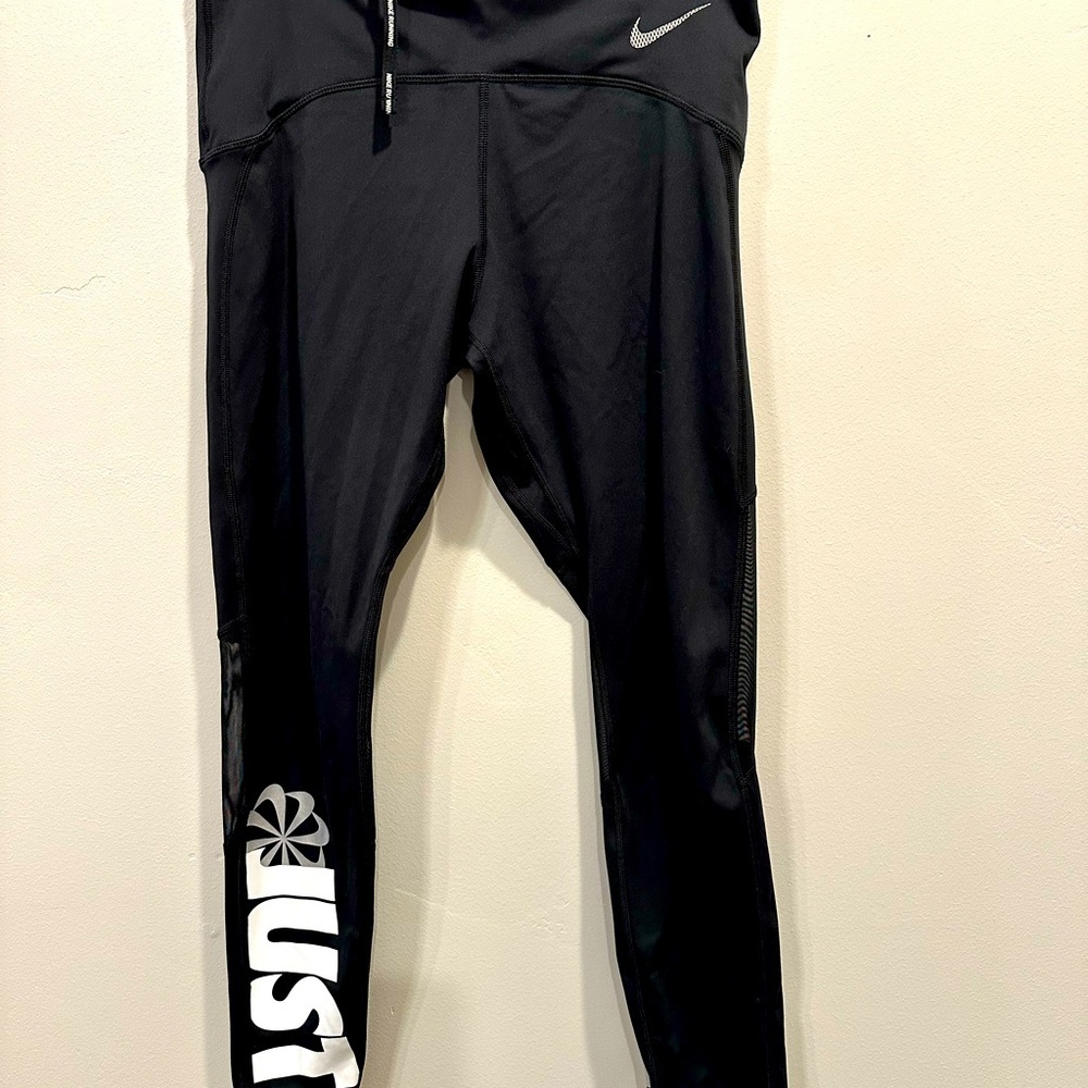 Just Do It Nike running pants. Size M. Black.